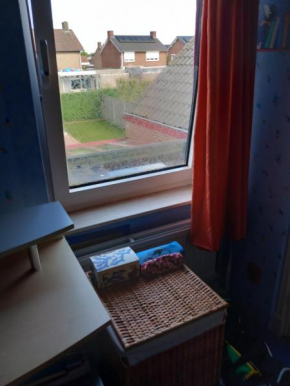 Eenpersoonskamer met gezamenlijke badkamer